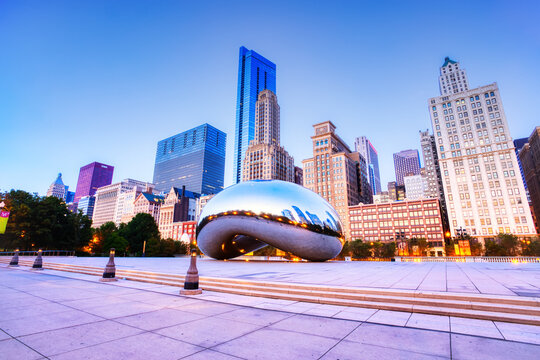 CHICAGO - September 3: Cloud Gate in Millennium Park on September 3, 2015 in Chicago. The Cloud Gate is a major tourist attraction and a gate to traditional Chicago Jazz Fest (September 3 - 6 2015).
