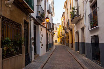 Fototapeta na wymiar Onda, Valencian Community, Spain. Empty Historic Street in Onda's old town.