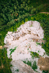Aerial View Of Domestic Garbage Near Green Forest. Bird's-eye View Of Junk. Domestic Waste In Landfill Junkyard. Eco Concept Garbage Disaster From Ecological Pollution Of Environment