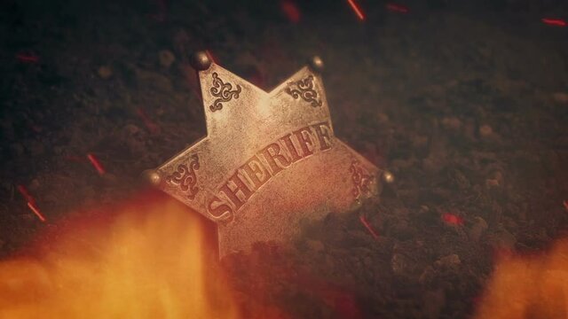 Sheriff Badge On Ground In Flames
