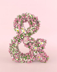 Creative and caracter concept made of fresh Spring wedding flowers. Flower font concept on pastel pink background..