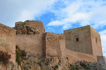 Medieval castle defensive fortress in beige stone  