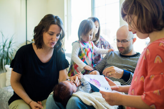 Mother, father parenting four kids, newborn during COVID lockdown