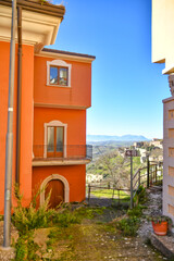 A street among the characteristic houses of Montecalvo Irpino, a village in the mountains in the province of Avellino, Italy.