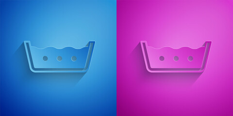 Paper cut Washing under 50 degrees celsius icon isolated on blue and purple background. Temperature wash. Paper art style. Vector
