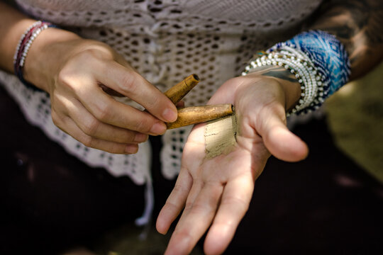 Paulo, SP, Brazil - November 23 2021: Hands of caucasian women holding kuripe and snuff details.