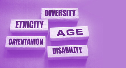 Diversity Etnicity age orientation disability words on wooden blocks. Social concept