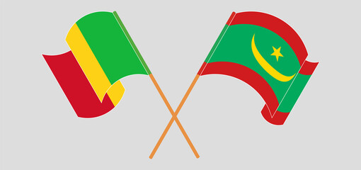 Crossed and waving flags of Mali and Mauritania
