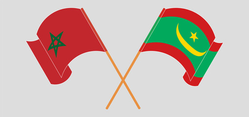 Crossed and waving flags of Morocco and Mauritania