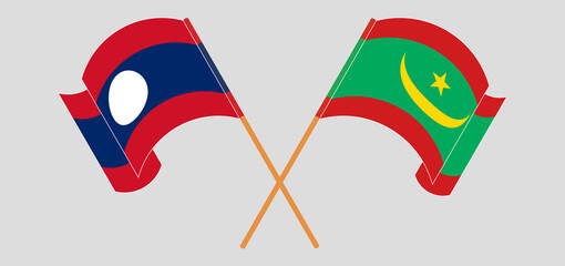 Crossed and waving flags of Laos and Mauritania