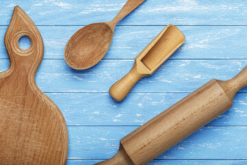 empty wooden food board and wooden kitchen items