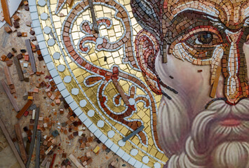 Fototapeta na wymiar Process of making mosaic. Church mosaic. Tools and smalt in mosaic studio.
