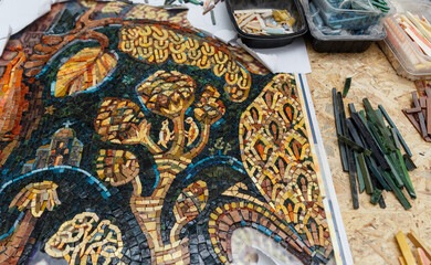 Process of making mosaic. Church mosaic. Tools and smalt in mosaic studio.