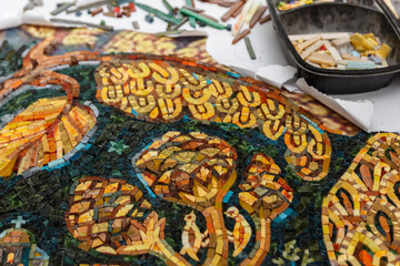 Process of making mosaic. Church mosaic. Tools and smalt in mosaic studio.