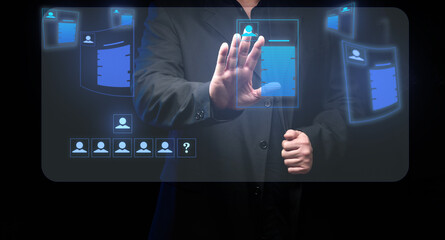 businessman standsaround a holographic screen with virtual resume. Selection of a candidate, search for a talented employee