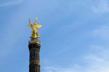 Fototapeta na wymiar Berlin Siegessaeule or the Column of Victory with the Statue of Victory on top of it.