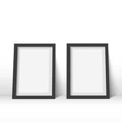 Realistic black poster frames on the wall. mock up. Vector