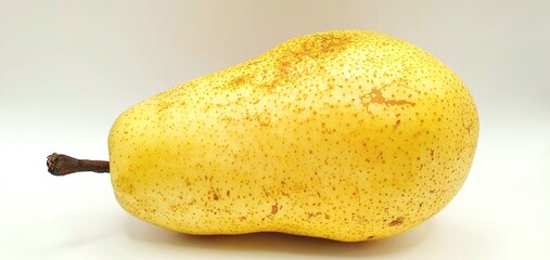 Ripe yellow pear isolated closeup. Juicy pear on a white background. Cosmetology and solving skin problems. Imperfect skin. Problem skin. The texture of the peel of a pear.
