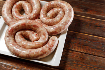 We can see long sausages in the picture.