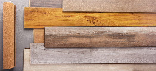 Laminate wood floor with cork background texture. Wooden laminate floor