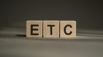 Alphabet letter in word ETC is abbreviation of et cetera written in cubes