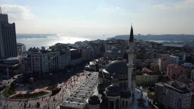 The Taksim Mosque. Taksim Square with people
