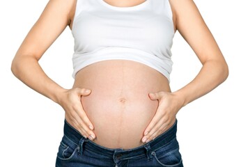 Beautiful pregnant woman holds her belly