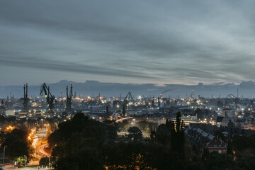 Morning panoramic view of poland city Gdańsk with the industrial island in Młyniska in background during the cloudy autumn morning