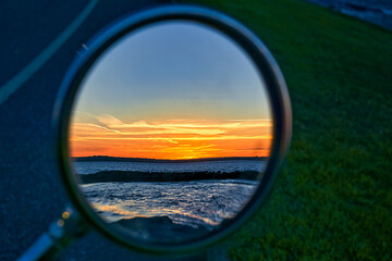 Sunset in Motorcycle Rear View Mirror