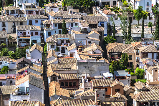 Beautiful aerial view city of Granada in a daytime. Granada - capital city of province of Granada, located at foot of Sierra Nevada Mountains. Granada, Andalusia, Spain. © dbrnjhrj