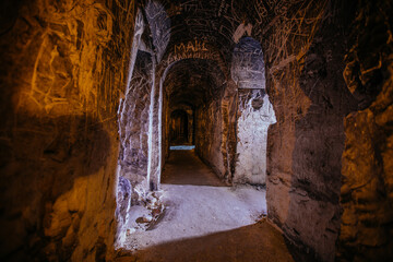 Dark creepy abandoned underground chalky cave temple