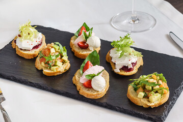 different kinds of canape on table