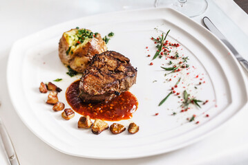 Fototapeta premium beef steak with potato and herbs