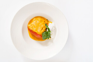 stuffed pepper with sauce, top view