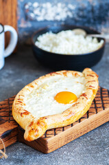 Khachapuri - traditional Georgian cheese and egg filled bread.