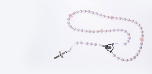 Holy catholic rosary and a cross - Text space - obrazy, fototapety, plakaty