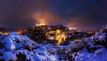 Lights of Toledo on after a winter snowstorm.