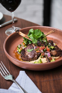 Wood Grilled Lamb Chops with mint and mixed vegitables.