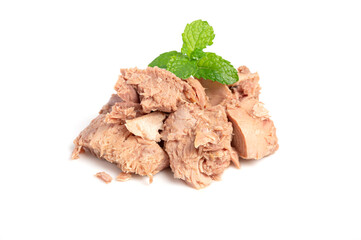 Canned tuna steak with mint leaves on white background.