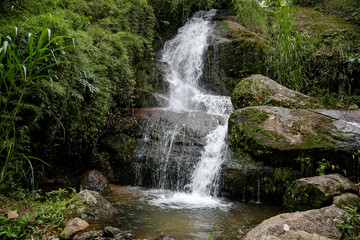 Fototapeta na wymiar Beautiful waterfall in nature with crystal clear waterfalls. 