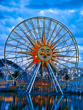 ANAHEIM, CA/USA - Nov 26,2010 : The Bright Colorful Lights Of Disney's California Adventure Amusement Park Is Reflected In The Lake