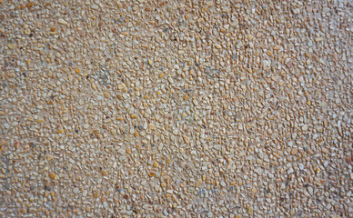 A stone-concrete surface next to a wall for backgrounds or other design illustrations and artwork.