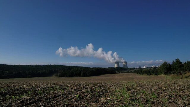 Nuclear power palnt Temelin Czech republic cooling towers  steaming energy production 