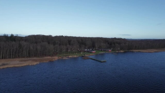 Aerial View Of Skanderborg Lakein Denmark, Fishing Water, Beautiful Lake and Forest - Truck Shot