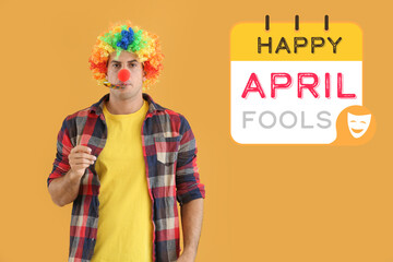 Man in funny disguise and with party whistle on color background. April Fool's Day celebration