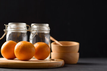 Fresh fruit oranges from local market on black background