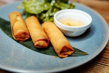 Fried chinese spring rolls with sweet chili sauce