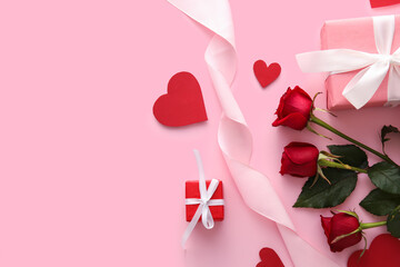 Composition with gifts for Valentine's Day and rose flowers on pink background