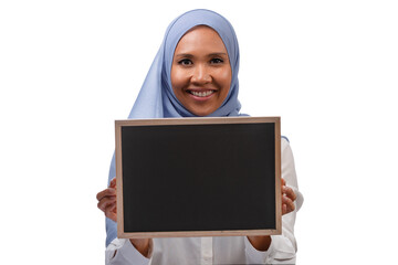 Young smiling Asian student girl holding a blank chalkboard isolated on white background