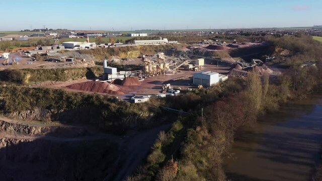 aerial view of a sand quarry beside the orne river in normandy